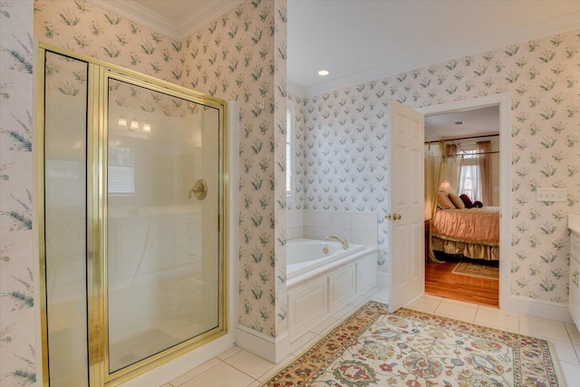 bathroom featuring separate shower and tub, tile patterned flooring, and ornamental molding