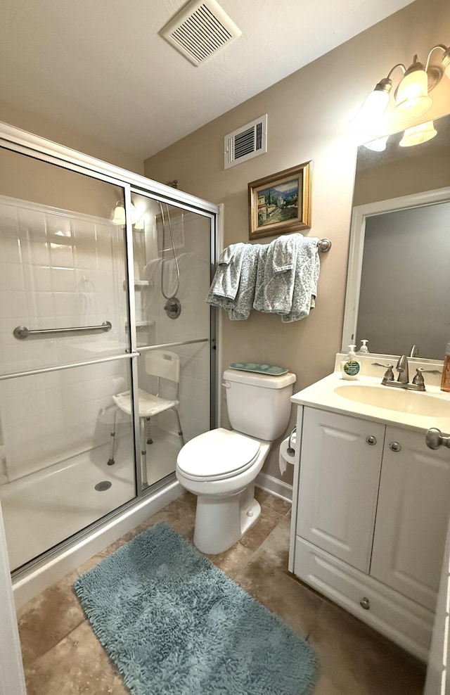 384 Connor Cir, Evans, GA 30809 - full bathroom with toilet, vanity, a stall shower, and tile patterned floors