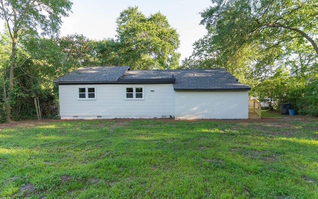 2011 Kennedy Dr, Augusta, GA 30904 - back of house featuring a yard, a shingled roof, and crawl space