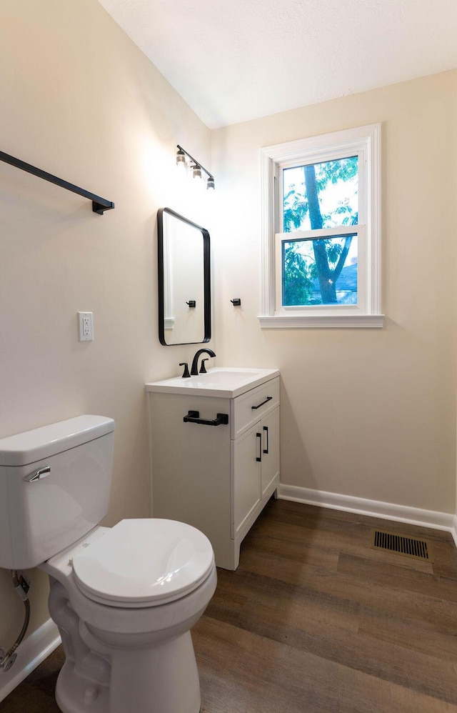 2011 Kennedy Dr, Augusta, GA 30904 - half bathroom featuring vanity and wood finished floors