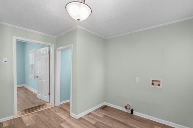 1940 Telfair St, Augusta, GA 30904 - laundry room featuring wood finished floors, hookup for a washing machine, baseboards, and ornamental molding