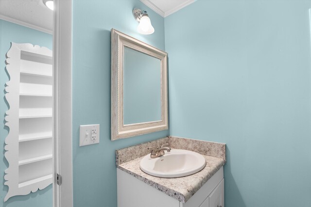 1940 Telfair St, Augusta, GA 30904 - bathroom with crown molding and vanity