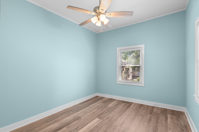 1940 Telfair St, Augusta, GA 30904 - unfurnished room with ornamental molding, wood finished floors, ceiling fan, and baseboards
