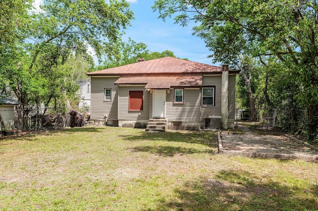1940 Telfair St, Augusta, GA 30904 - rear view of property featuring entry steps, central air condition unit, and a chimney