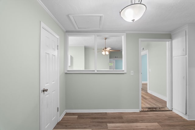1940 Telfair St, Augusta, GA 30904 - spare room with wood finished floors, baseboards, crown molding, and ceiling fan