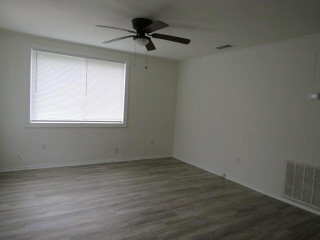 2480 Miles Ave, Augusta, GA 30906 - empty room with a ceiling fan and wood finished floors