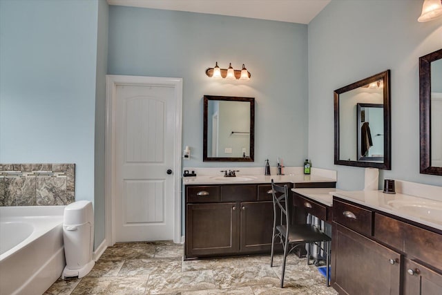 bathroom with a bathing tub and vanity