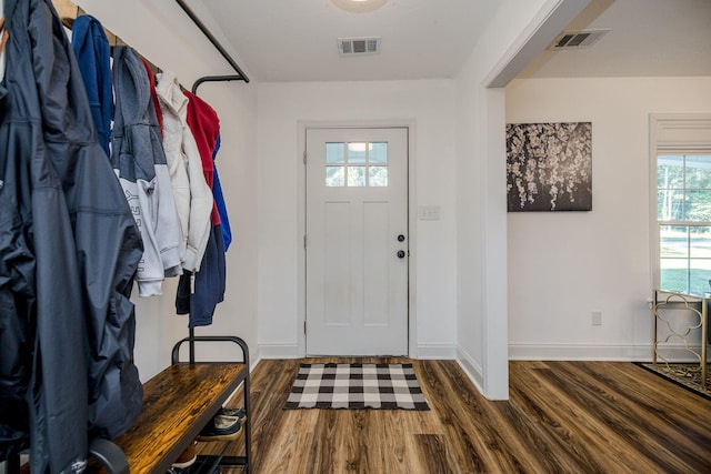 entrance foyer with dark hardwood / wood-style floors