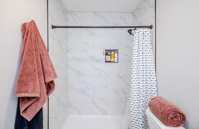 bathroom with curtained shower