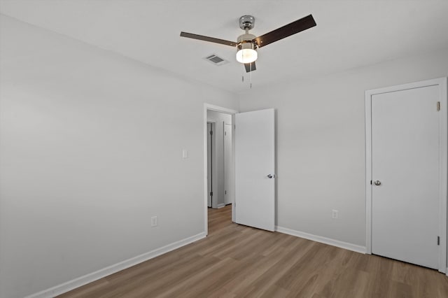 4221 Cap Chat St, Hephzibah, GA 30815 - unfurnished bedroom featuring wood finished floors and ceiling fan