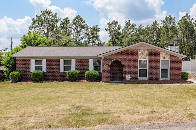 4221 Cap Chat St, Hephzibah, GA 30815 - ranch-style home with a front yard and brick siding