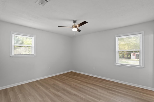 4221 Cap Chat St, Hephzibah, GA 30815 - spare room featuring light wood-style flooring and ceiling fan