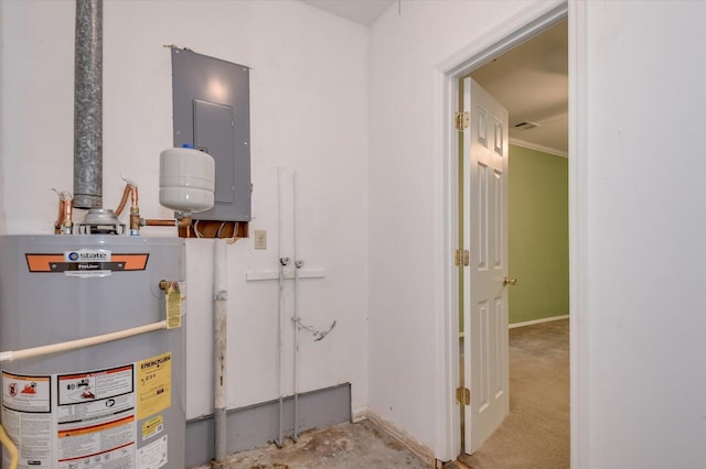 utilities featuring visible vents, gas water heater, and electric panel