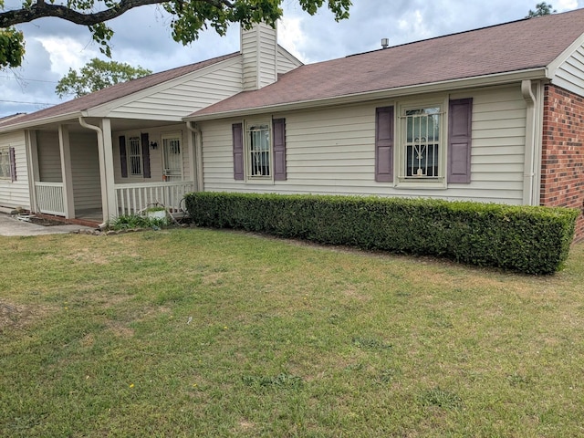 3807 Fairington Dr, Hephzibah, GA 30815 - unfurnished living room featuring baseboards, a brick fireplace, ceiling fan, and a healthy amount of sunlight