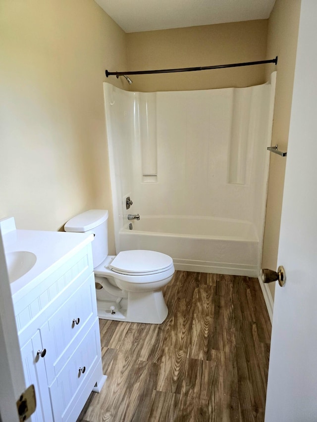 3807 Fairington Dr, Hephzibah, GA 30815 - full bathroom with wood finished floors, toilet, vanity, and shower / tub combination