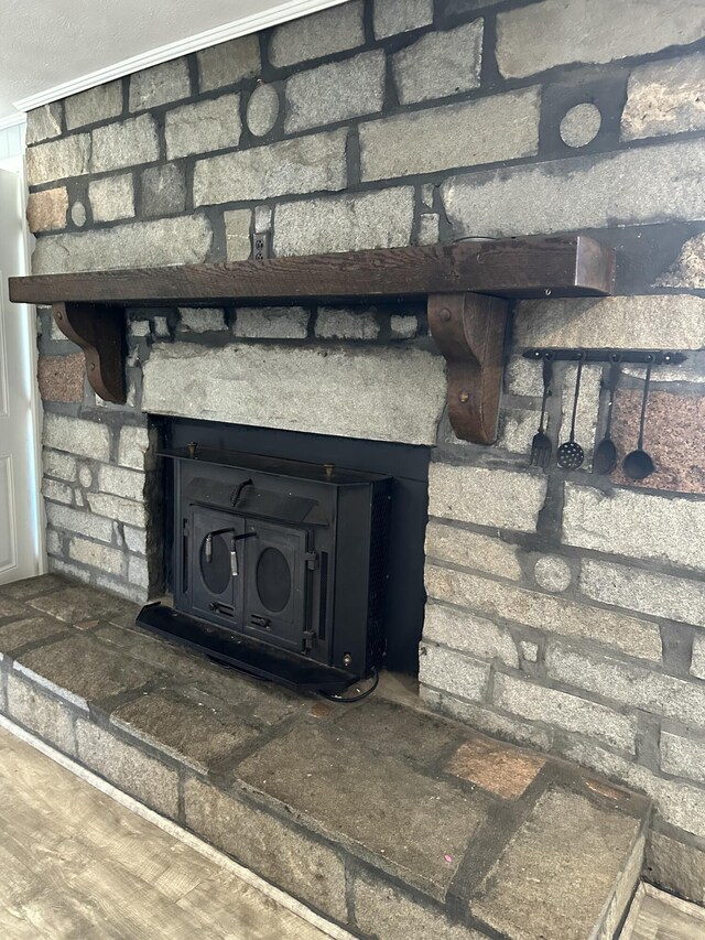 details with ornamental molding and a wood stove