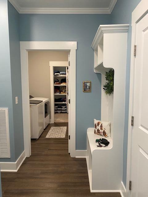 256 Candlewick Loop, Mccormick, SC 29835 - mudroom featuring separate washer and dryer, dark wood-style floors, and crown molding