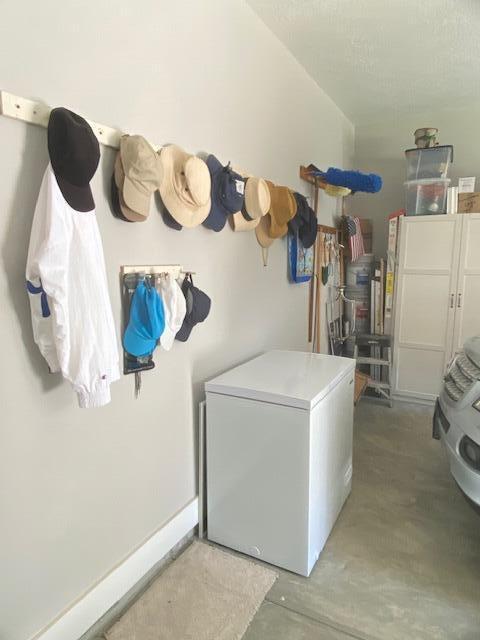 256 Candlewick Loop, Mccormick, SC 29835 - garage with refrigerator