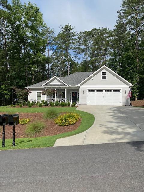 256 Candlewick Loop, Mccormick, SC 29835 - view of front of home with concrete driveway and an attached garage