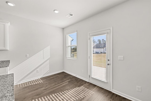 interior space featuring dark hardwood / wood-style flooring