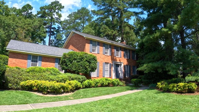 colonial house with a front yard