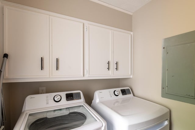 4387 Quail Creek Rd, Martinez, GA 30907 - laundry room featuring electric panel, washer and clothes dryer, and cabinet space