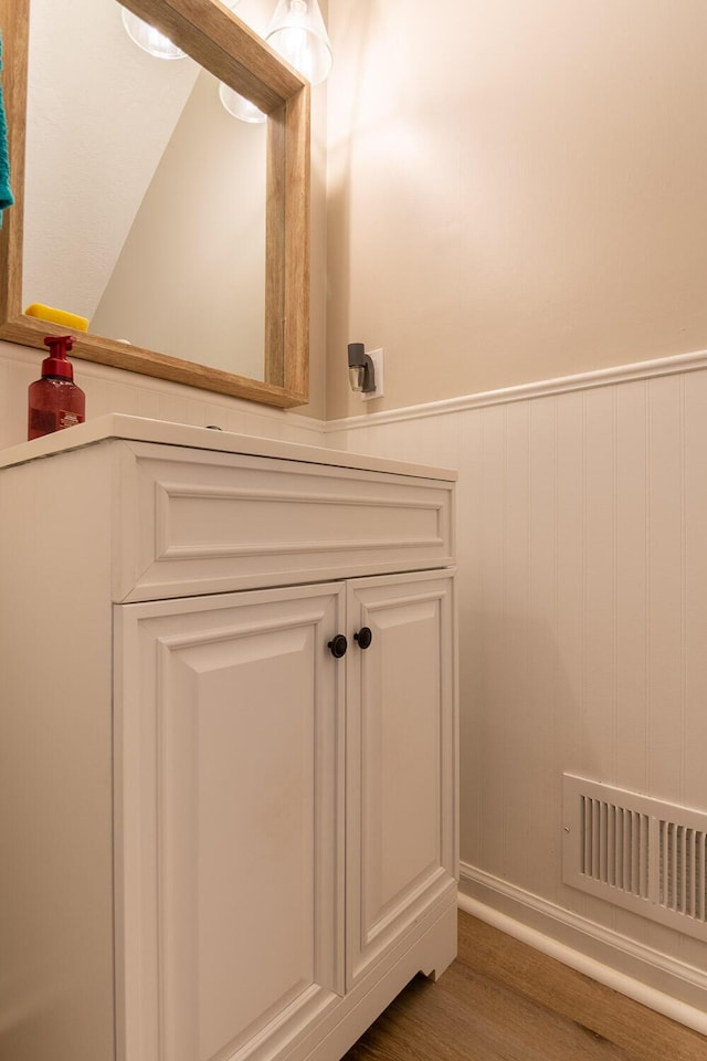 4387 Quail Creek Rd, Martinez, GA 30907 - bathroom with wainscoting and wood finished floors