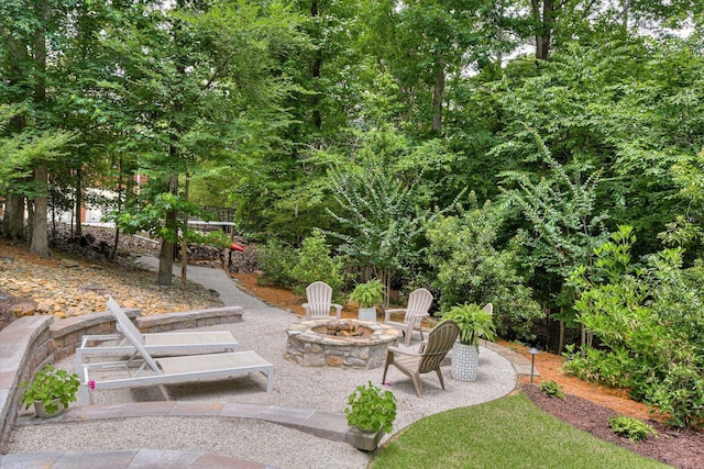 view of patio with an outdoor fire pit