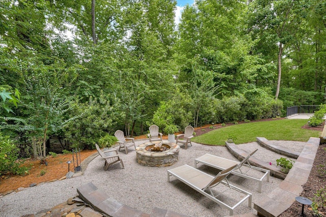 view of patio featuring an outdoor fire pit