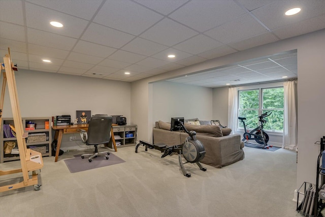 office area with carpet and a paneled ceiling