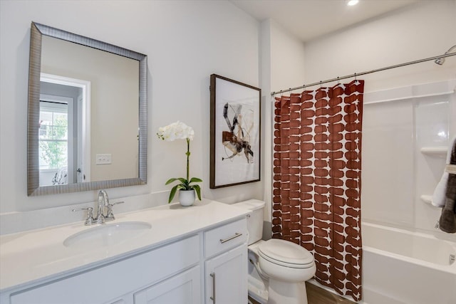 full bathroom featuring vanity, toilet, and shower / tub combo with curtain