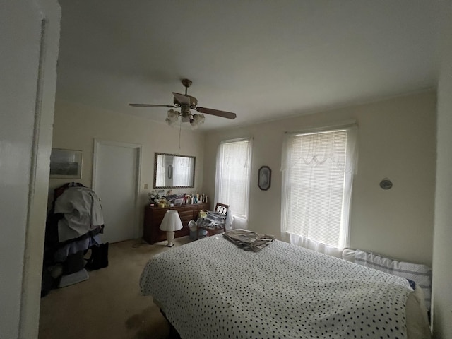 bedroom featuring carpet flooring and ceiling fan