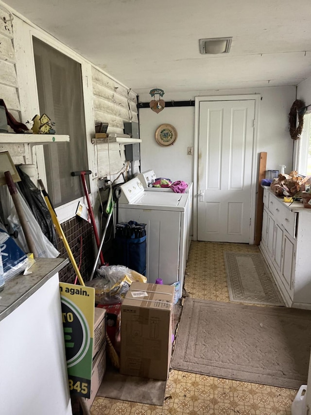 washroom with washer and clothes dryer