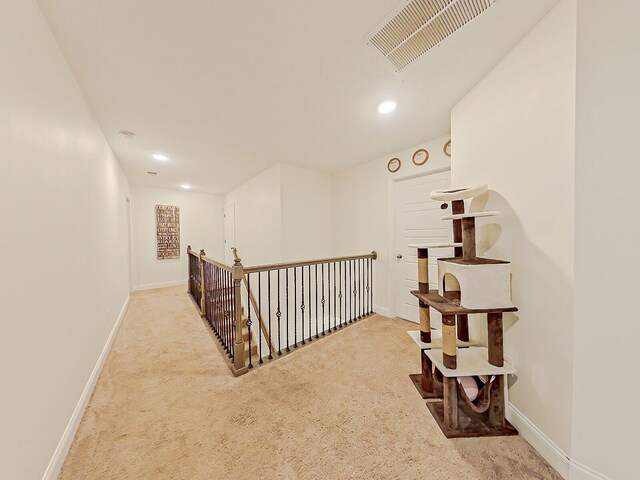 corridor with carpet floors