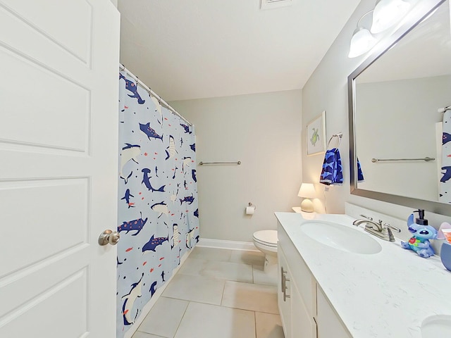 bathroom with toilet, vanity, tile patterned floors, and a shower with shower curtain