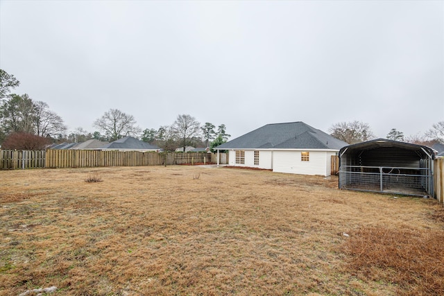 view of yard with a carport