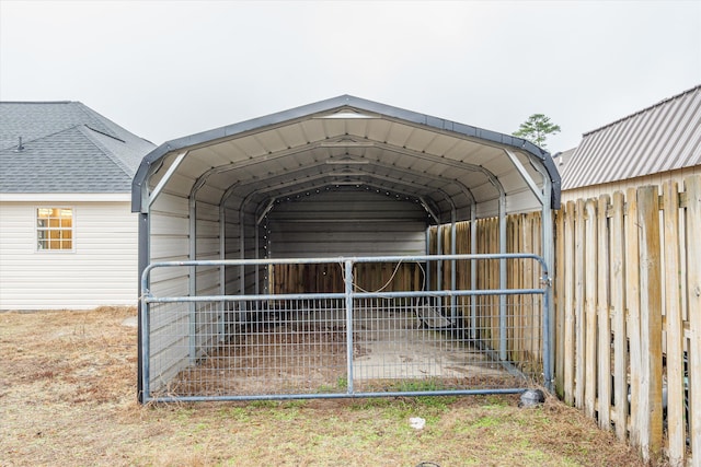 view of outdoor structure with a carport