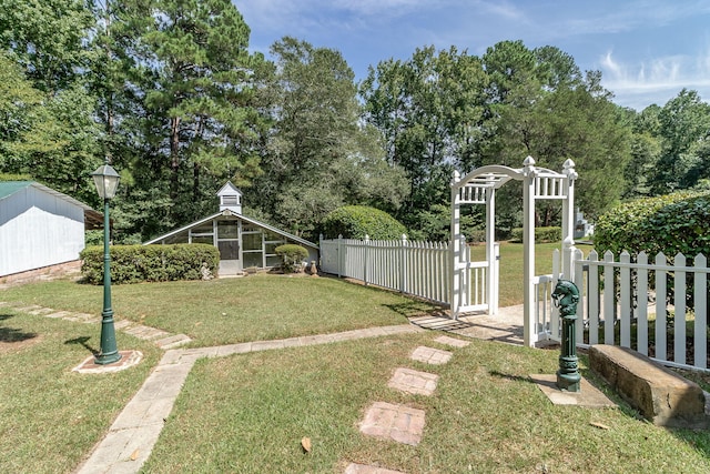 view of yard with a sunroom