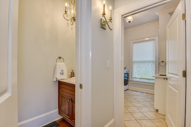 324 E Shoreline Dr, North Augusta, SC 29841 - bathroom with vanity, tile patterned floors, crown molding, and baseboards