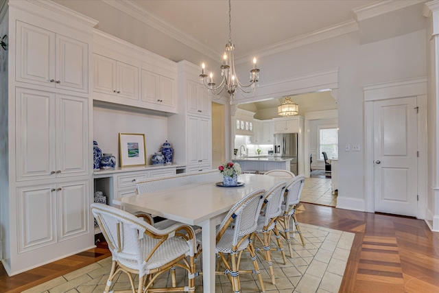 324 E Shoreline Dr, North Augusta, SC 29841 - dining area with a chandelier, crown molding, and baseboards