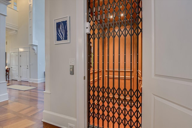 324 E Shoreline Dr, North Augusta, SC 29841 - elevator featuring a gate, wood finished floors, and baseboards
