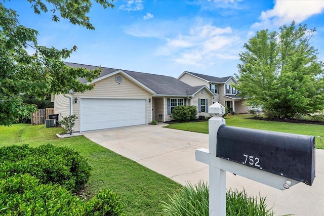 752 Keyes Dr, Grovetown, GA 30813 - traditional home with a front yard, an attached garage, concrete driveway, and central air condition unit