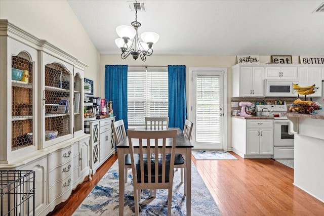 752 Keyes Dr, Grovetown, GA 30813 - dining area featuring a chandelier and light wood-style floors