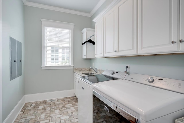 clothes washing area featuring electric panel, crown molding, washing machine and dryer, a sink, and baseboards