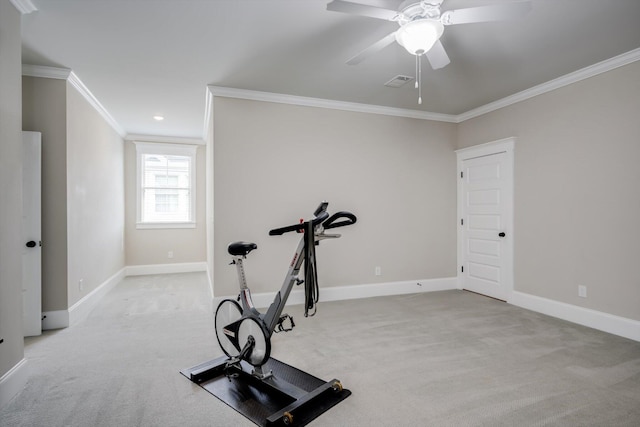 workout room featuring light colored carpet, ceiling fan, visible vents, and ornamental molding