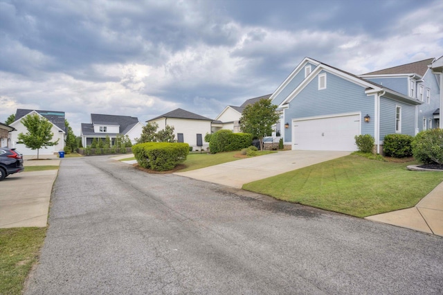 view of front of house featuring a residential view and a front lawn