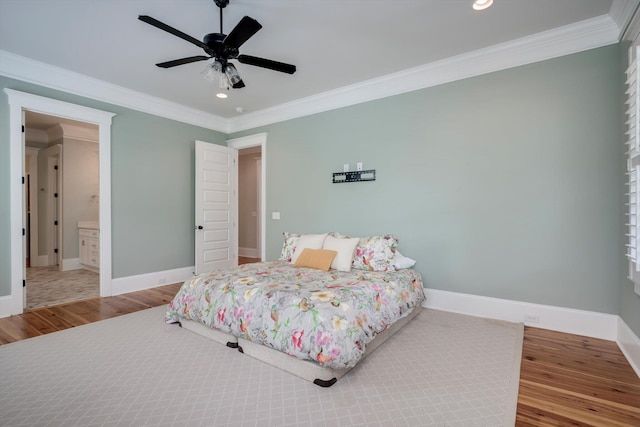 bedroom featuring crown molding, recessed lighting, baseboards, and wood finished floors
