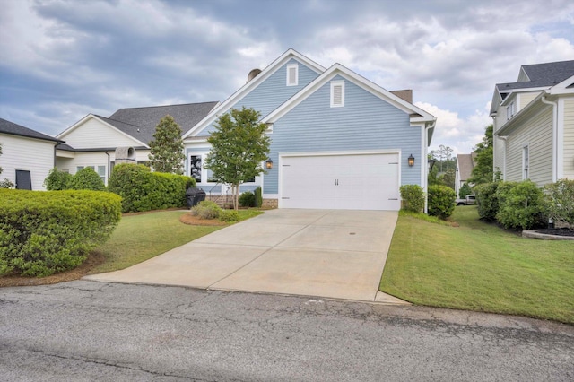 craftsman-style home featuring an attached garage, a chimney, driveway, and a front yard
