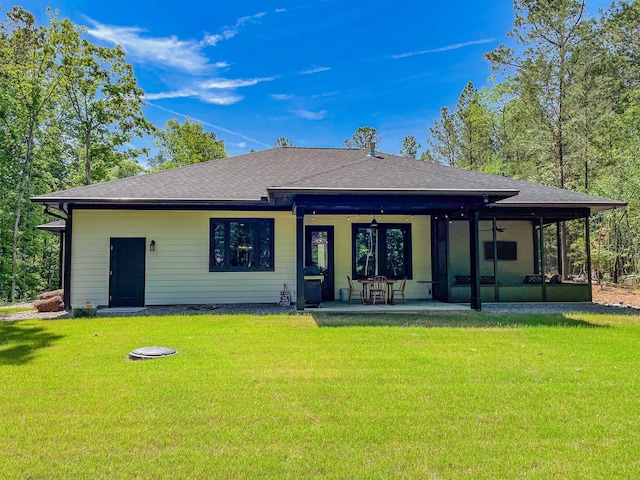 217 Cove Point Ln, Mccormick, SC 29835 - back of property with a yard, roof with shingles, a ceiling fan, and a patio area