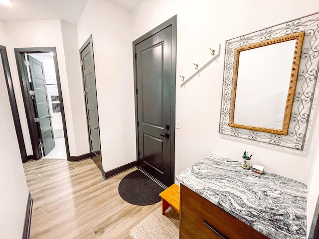 217 Cove Point Ln, Mccormick, SC 29835 - bathroom with wood finished floors, baseboards, and vanity